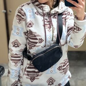 Geometric Patterned Hoodie with Black Crossbody Bag